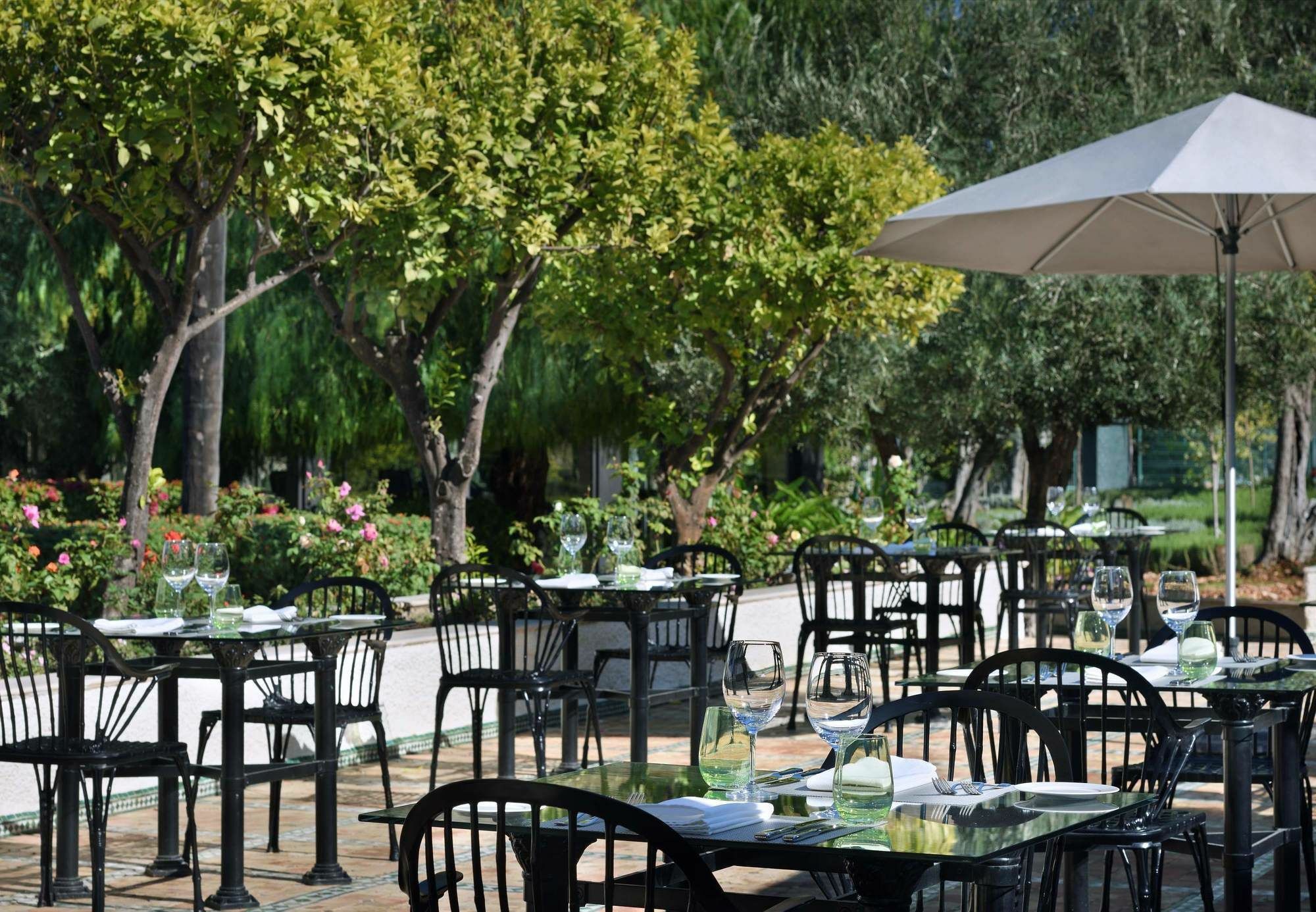 Fes Marriott Hotel Jnan Palace Exterior photo The outdoor patio at the restaurant